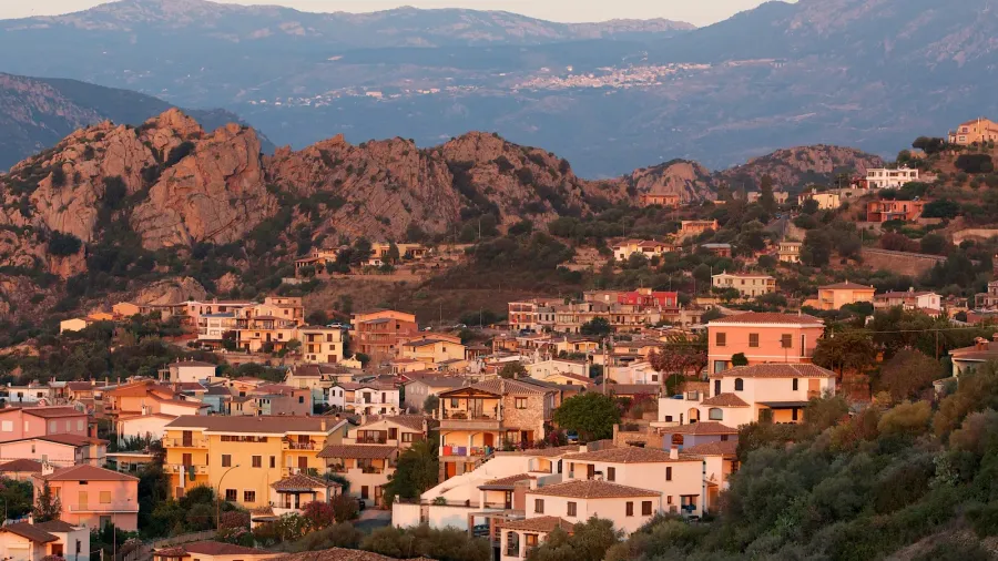 santa maria navarrese village in sardinia in warm sunrise light