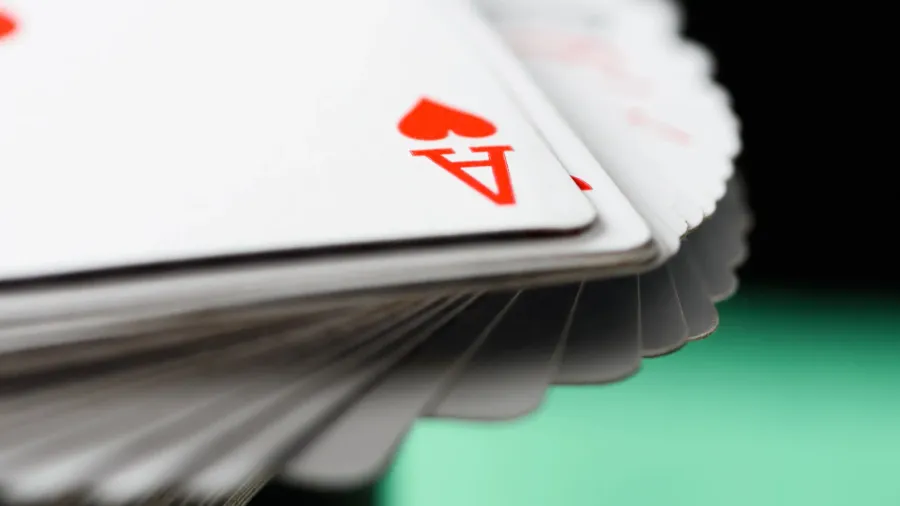 selective focus of ace playing card with hearts suit in