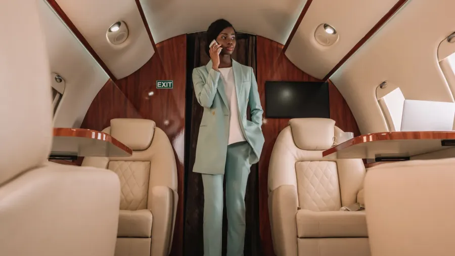 selective focus of attractive african american businesswoman talking on smartphone