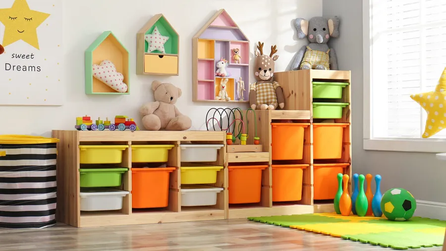 A playroom interior with toys, playing at, wooden shelf with storage baskets, and floating shelves.