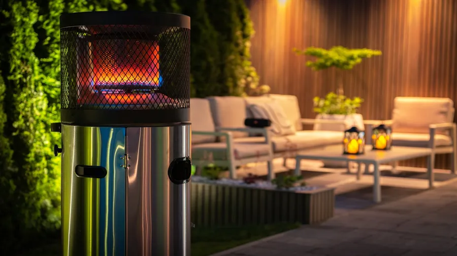 An outdoor propane heater on a patio.