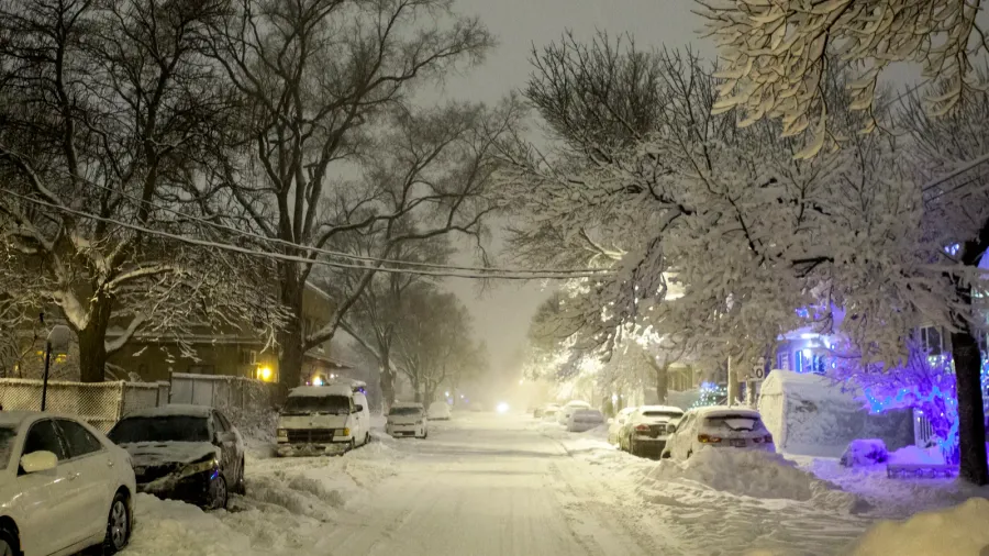 snowy street at night in montreal