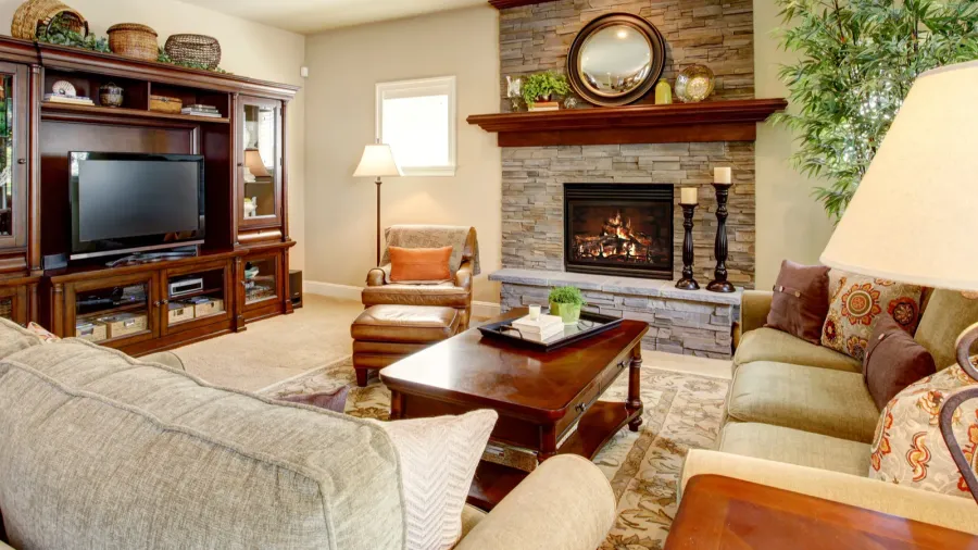 spacious living room with fireplace carpet floor and rug