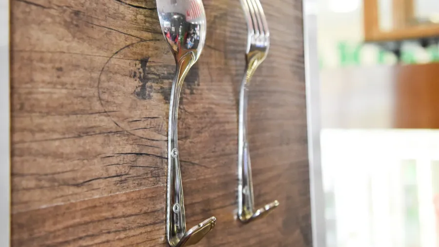 spoon and fork as hooks for clothes the decor of