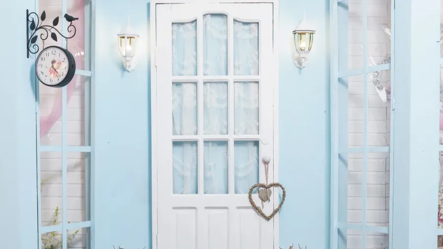 spring photo zone white door metal lamps on the wall