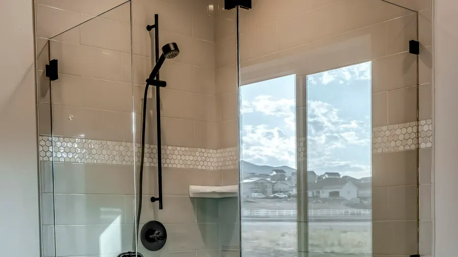 square rectangular walk in shower stall with half glass enclosure