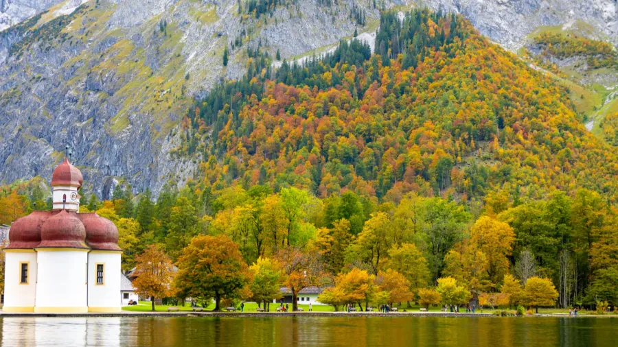st bartholomews church on konigssee lake in berchtesgaden during fall