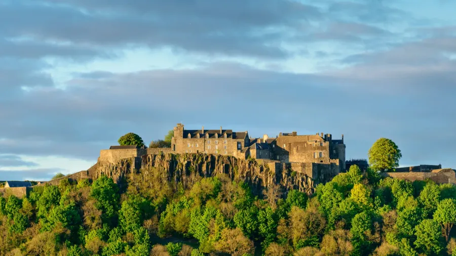stirling castle in setting sunlight