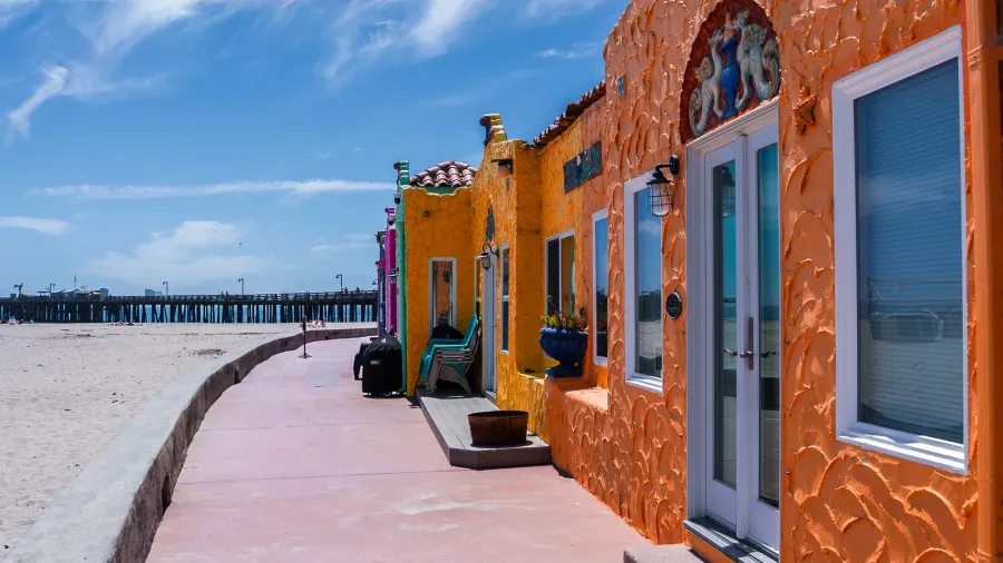 stucco cottages of capitola venetian court show orange and yellow