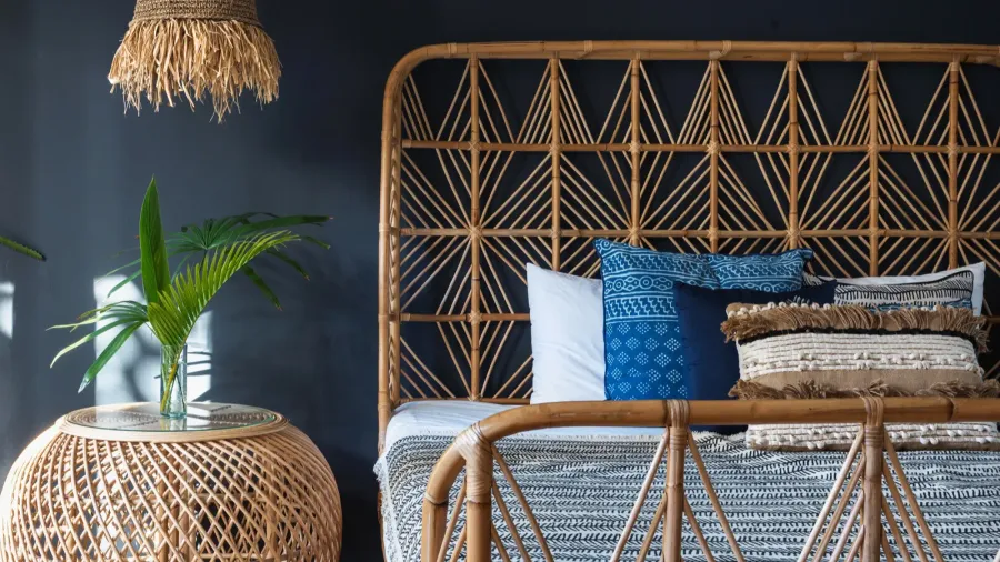 stylish bedroom interior at modern house with ethnic decor lamp