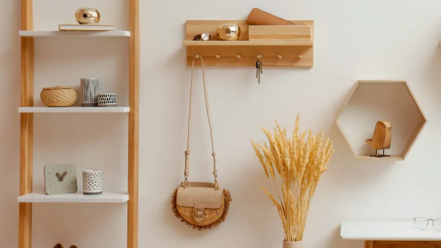 stylish hanger for keys on white wall in hallway