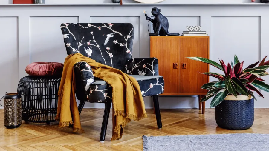 cstylish interior of living room with design armchair wooden vintage