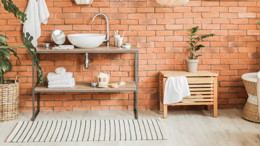 stylish interior of modern bathroom with clean towels