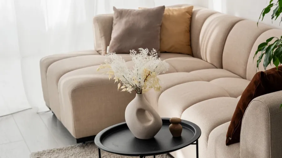 stylish living room features a plush sectional sofa and elegant