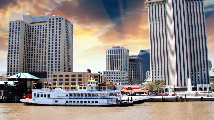 sunset above new orleans with mississippi river