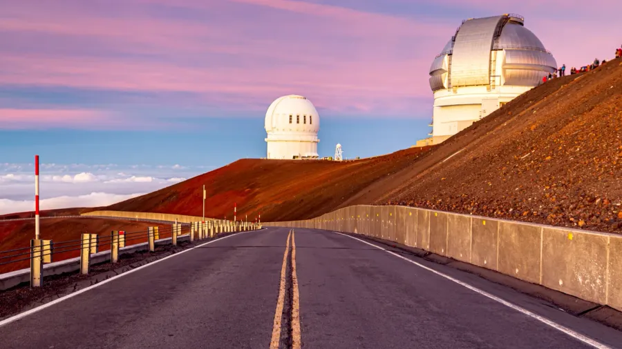 sunset of mauna kea observatory in big island hawaii
