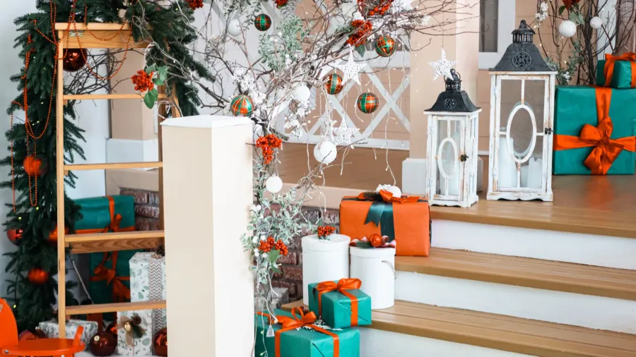 this delightful holiday setting features a wooden rocking horse alongside