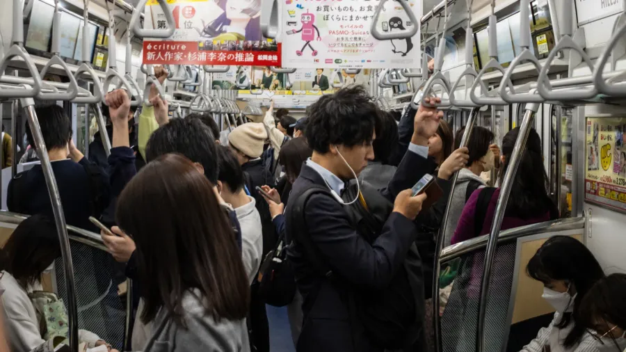 tokyo japan 27 october 2023 crowded subway car interior in