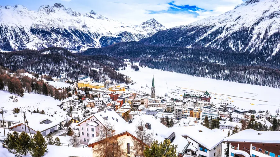 town and frozen lake of sankt moritz luxury winter travel