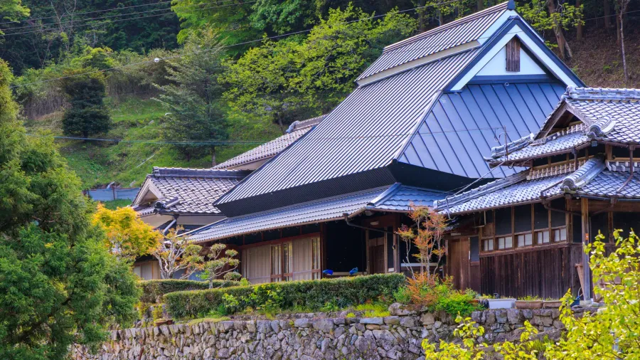 traditional japanese house on stone terrace in mountain village high