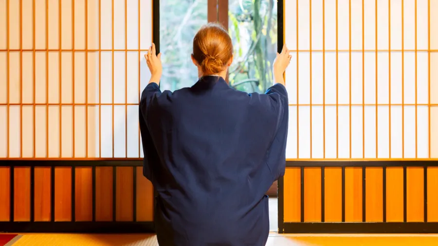 traditional japanese house or ryokan with gaijin caucasian woman in