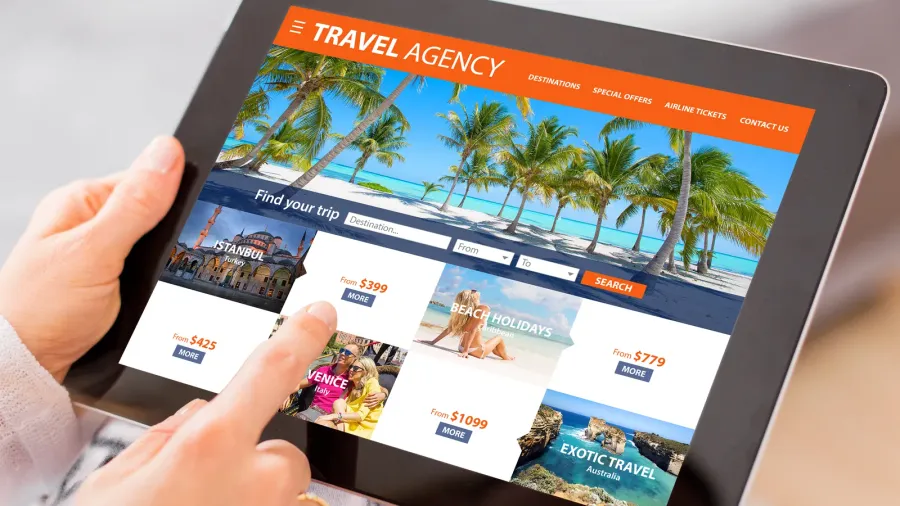 travel agencys website on tablet computer