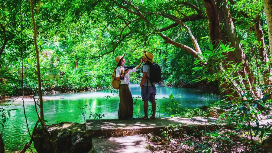 travelers couples with natural travel backpacks during the holidays couples