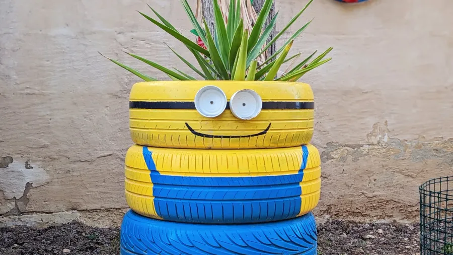 upcycled tires become artistic garden planters showcasing handmade creativity playful