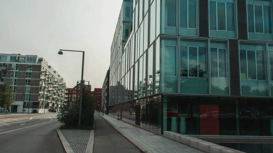 urban street with walkway buildings and sky at background in
