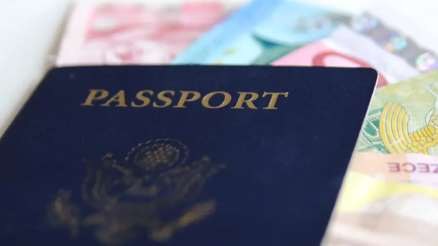 usa passport and international currencies