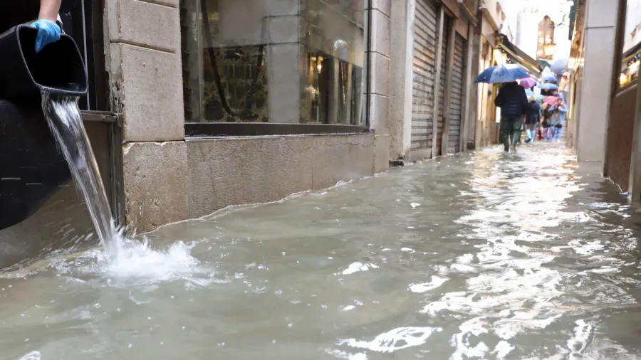 venetian street completely submerged by high tide and the emptyi