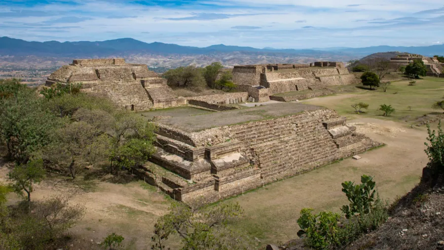 view of the ancient ruins of the monte alban pyramid