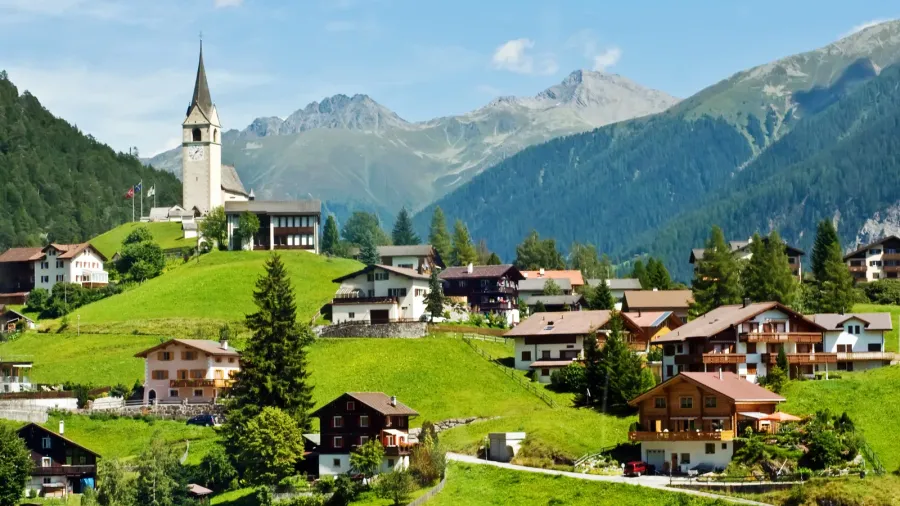 village and chapel in swiss alps