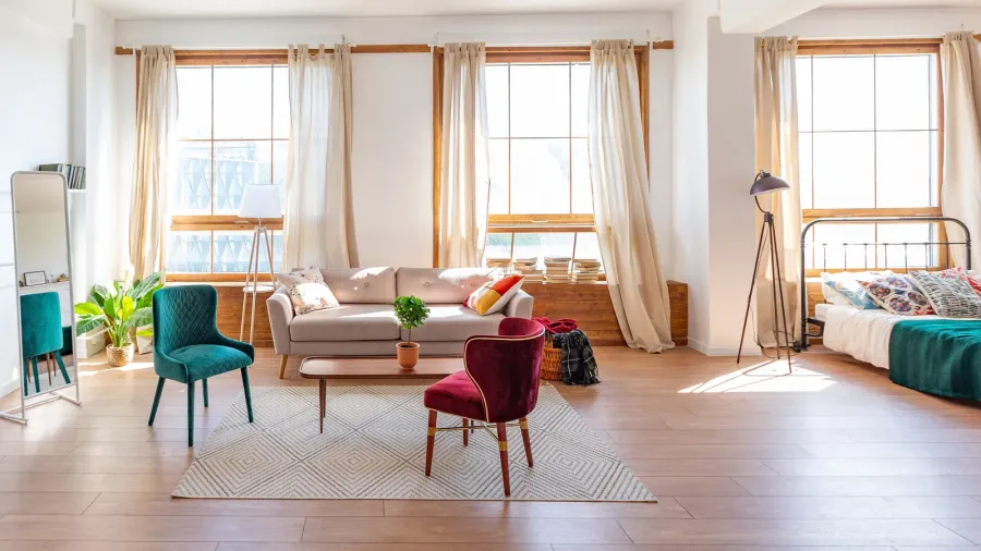 vintage studio apartment interior in light colors in old style