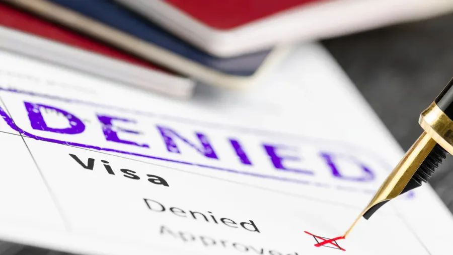 visa application denied close up shot of a form passports