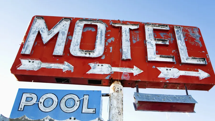 weathered retro motel sign