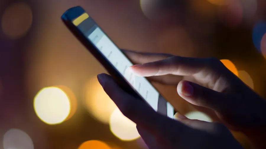 woman using her mobile phone