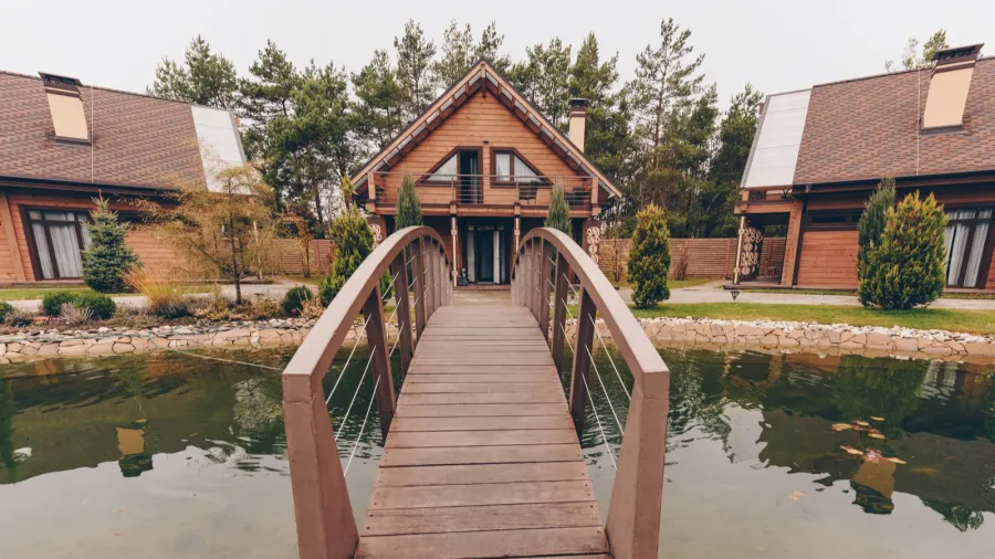 wooden bridge over pond