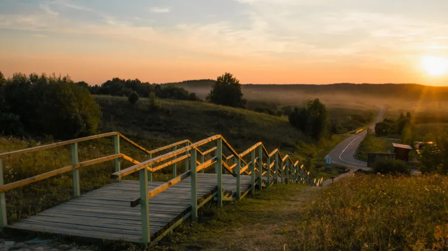 wooden stairs at sunset