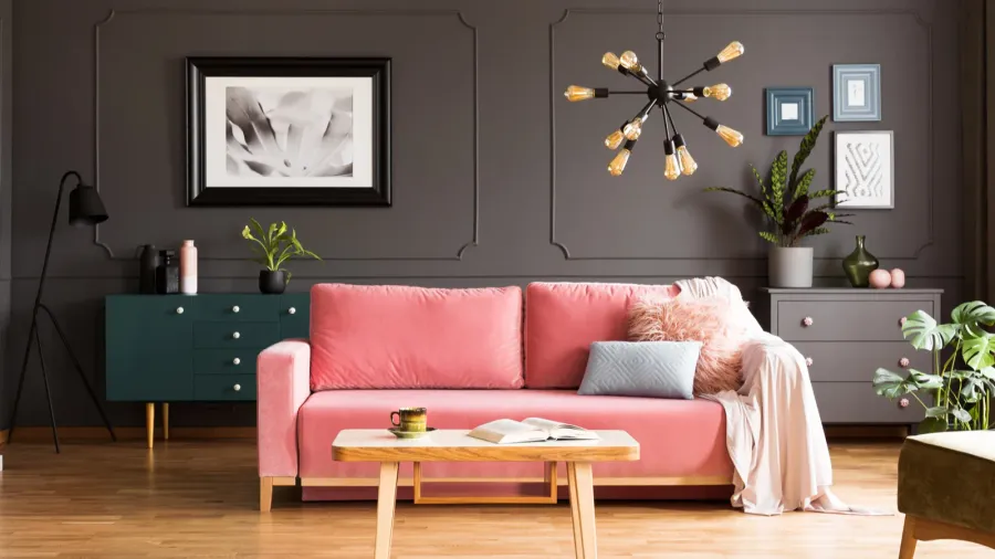wooden table on blue carpet in grey living room interior