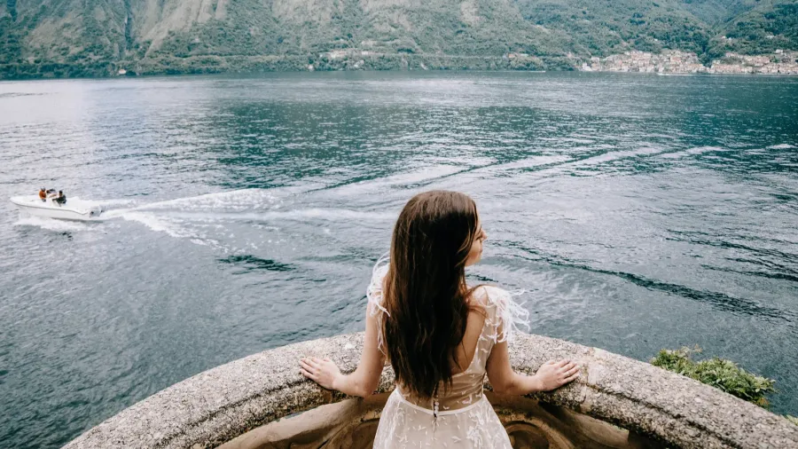 young caucasian bride on como lake in italy
