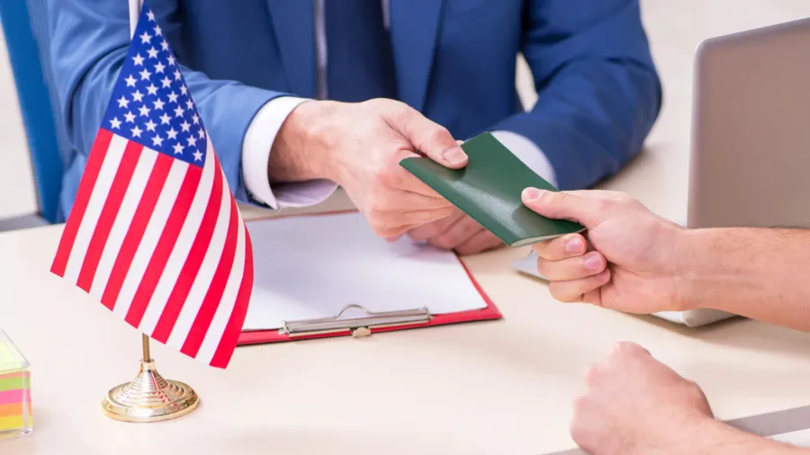 young man visiting embassy for visa application
