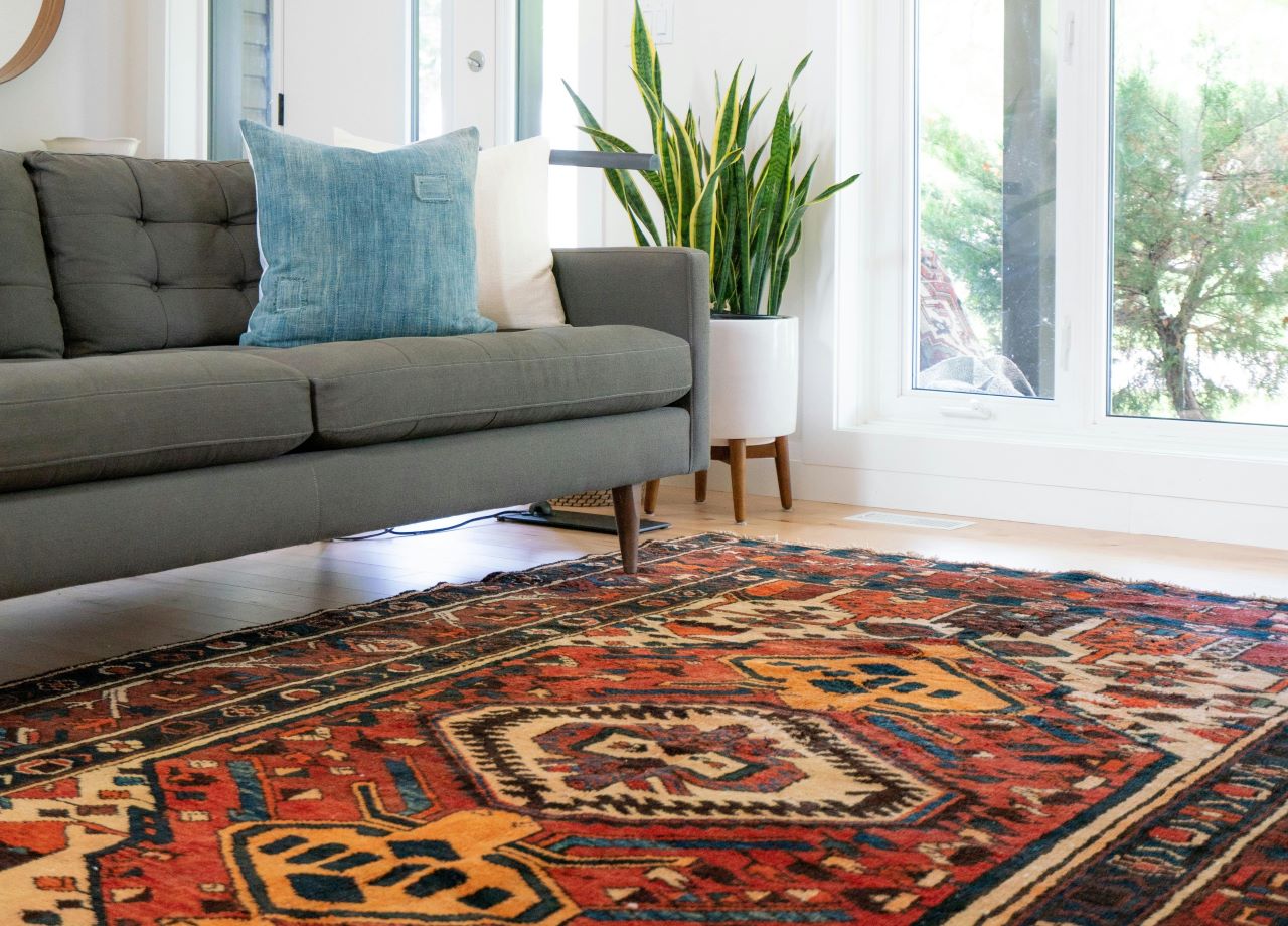 Assess a rug's quality by its construction, material, and brand reputation.
