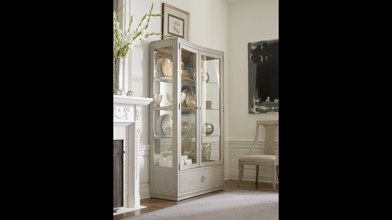 A sturdy glass cupboard is best to showcase your fathers collectibles 