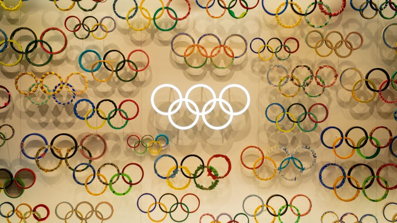 A wall with olympic logo