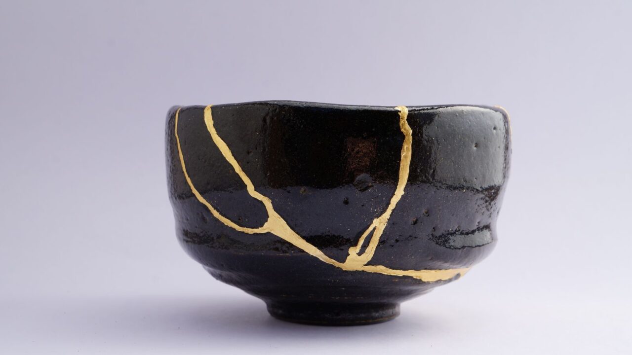 Black and golden bowl