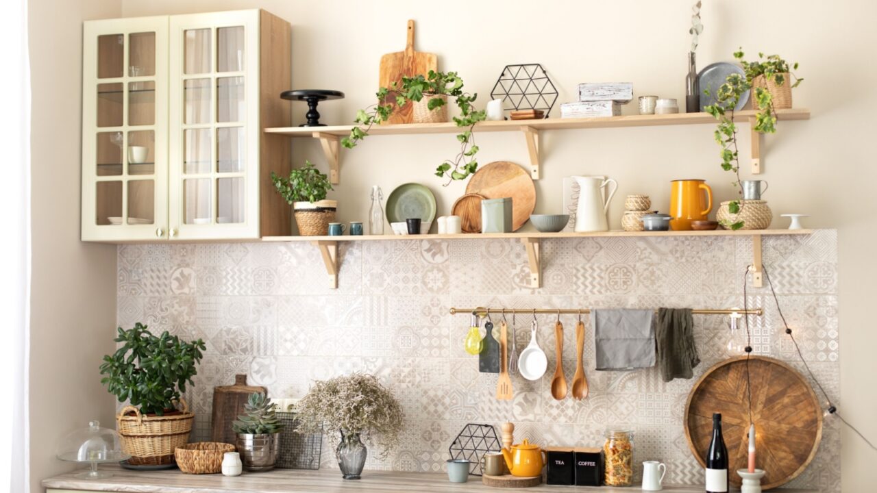 modern interior kitchen with open shelves displaying cutlery and kitchen accessories