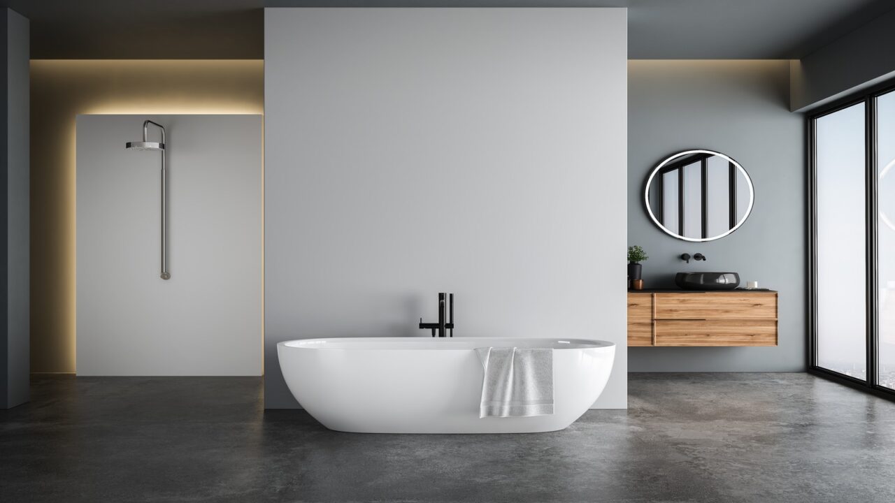 Modern design washroom with rain showerhead, white bathtub, and round mirror