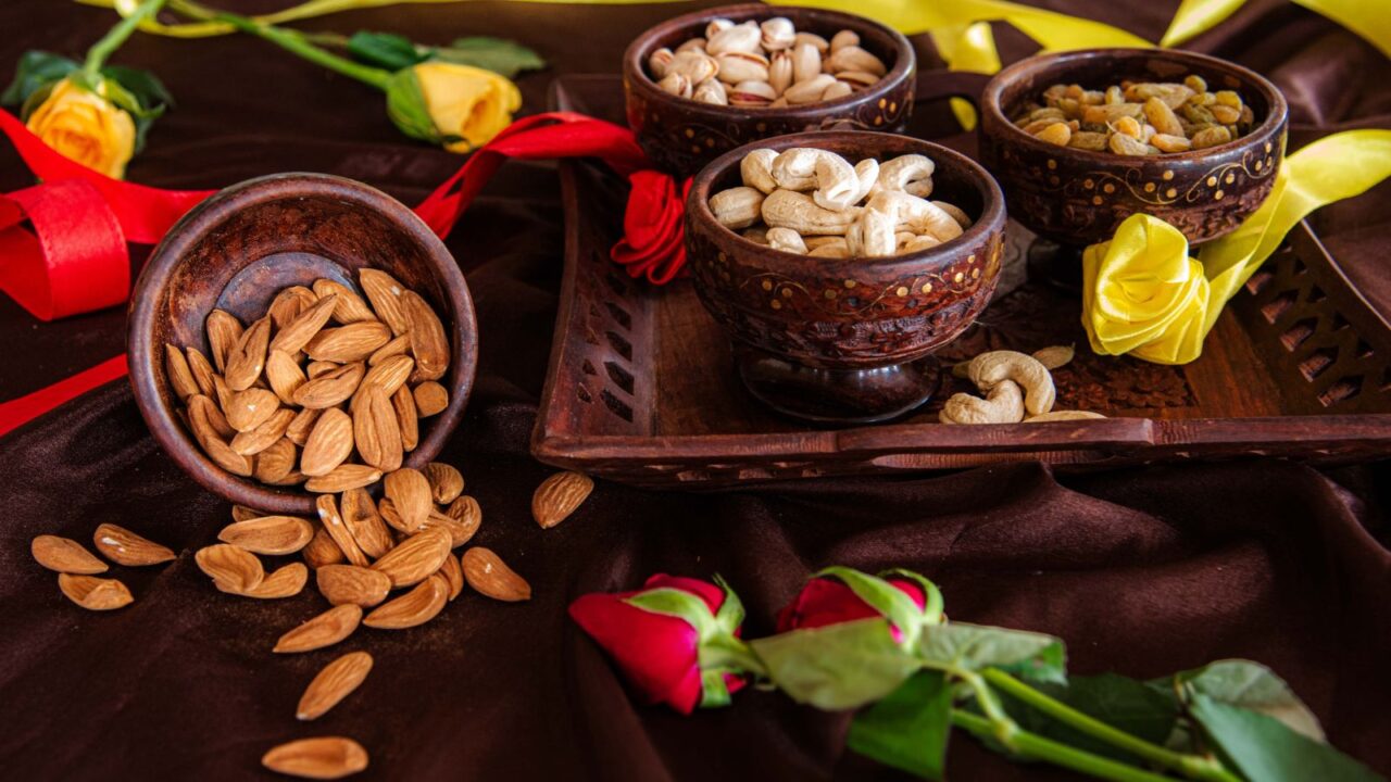 A variety of nuts arranged together to make a centerpiece