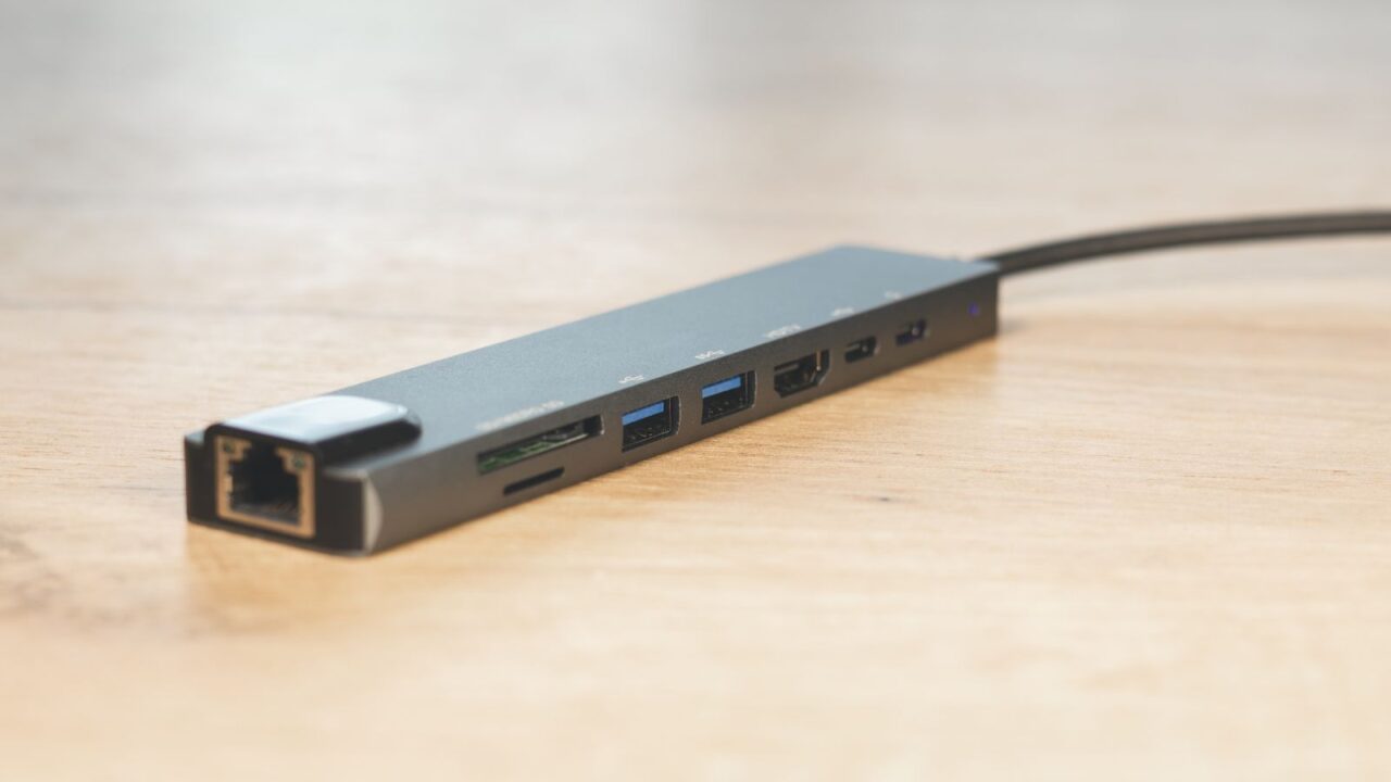 Laptop USB Type-C adapter with different connectors for connecting devices.